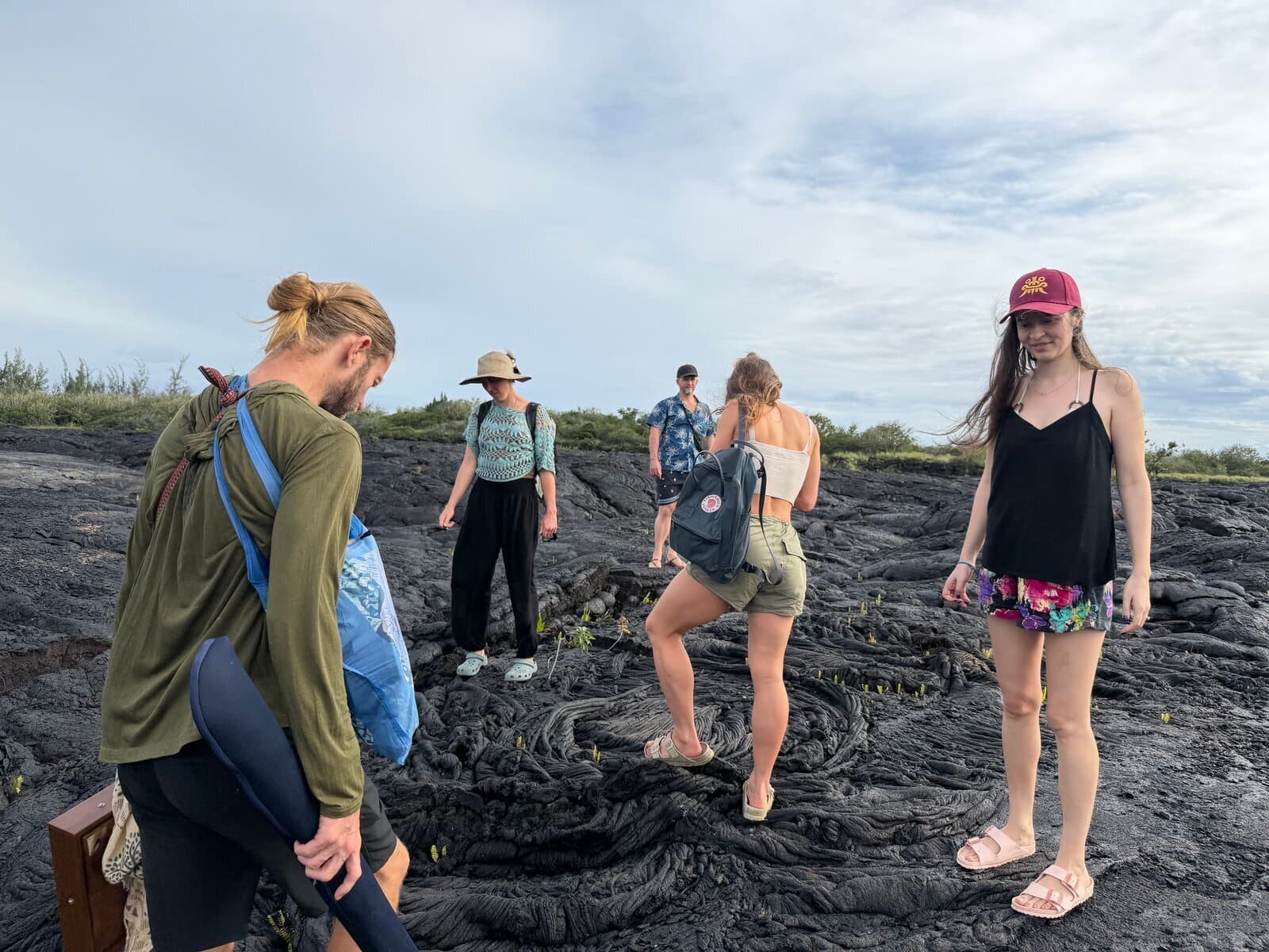 Sacred Ways group walking across a Big Island lava field